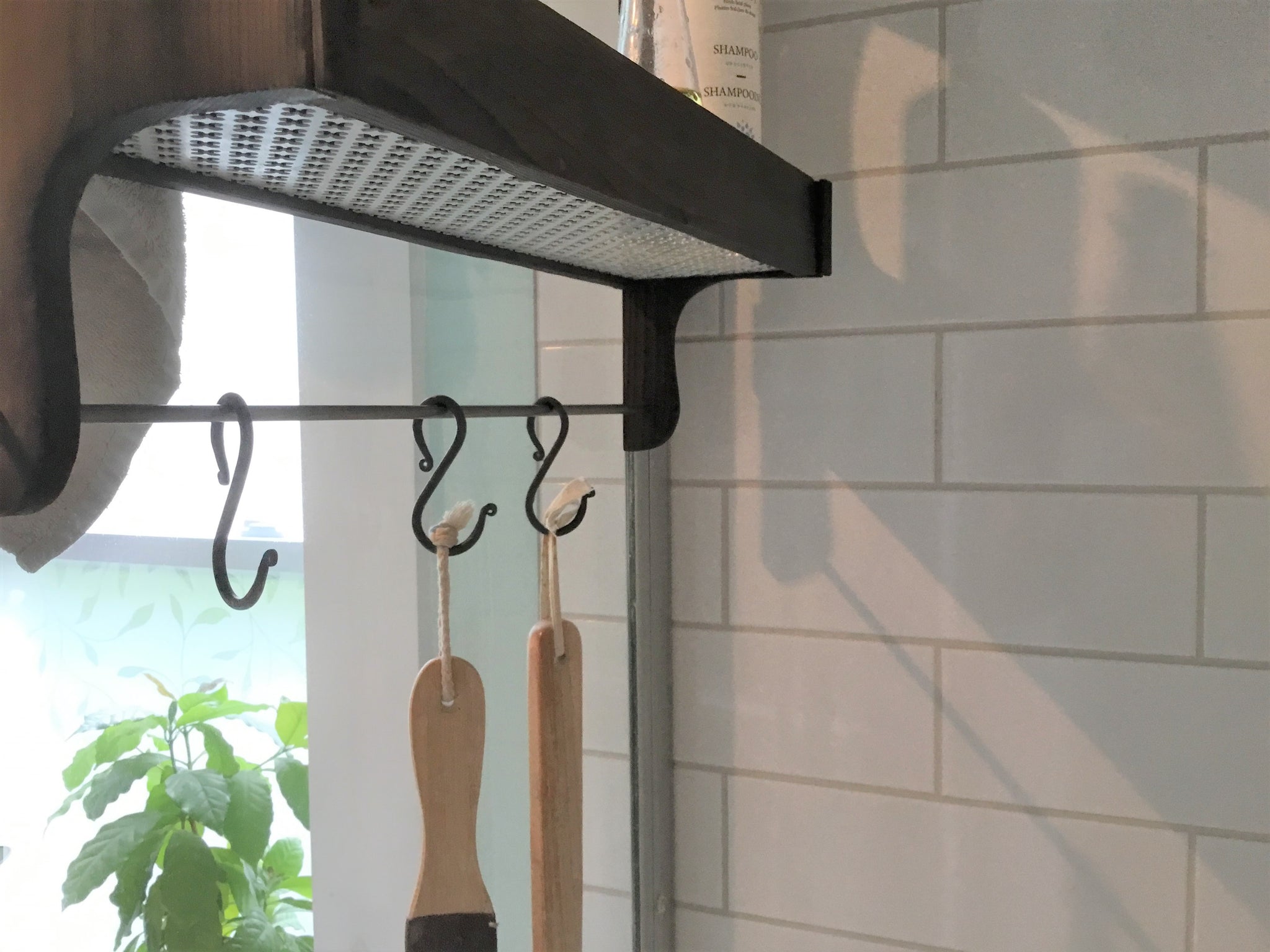 https://sharonmforthehome.com/cdn/shop/products/Sharon_M_for_the_Home-wrought_iron_hooks-shower_caddy_1024x1024@2x.jpg?v=1577899055